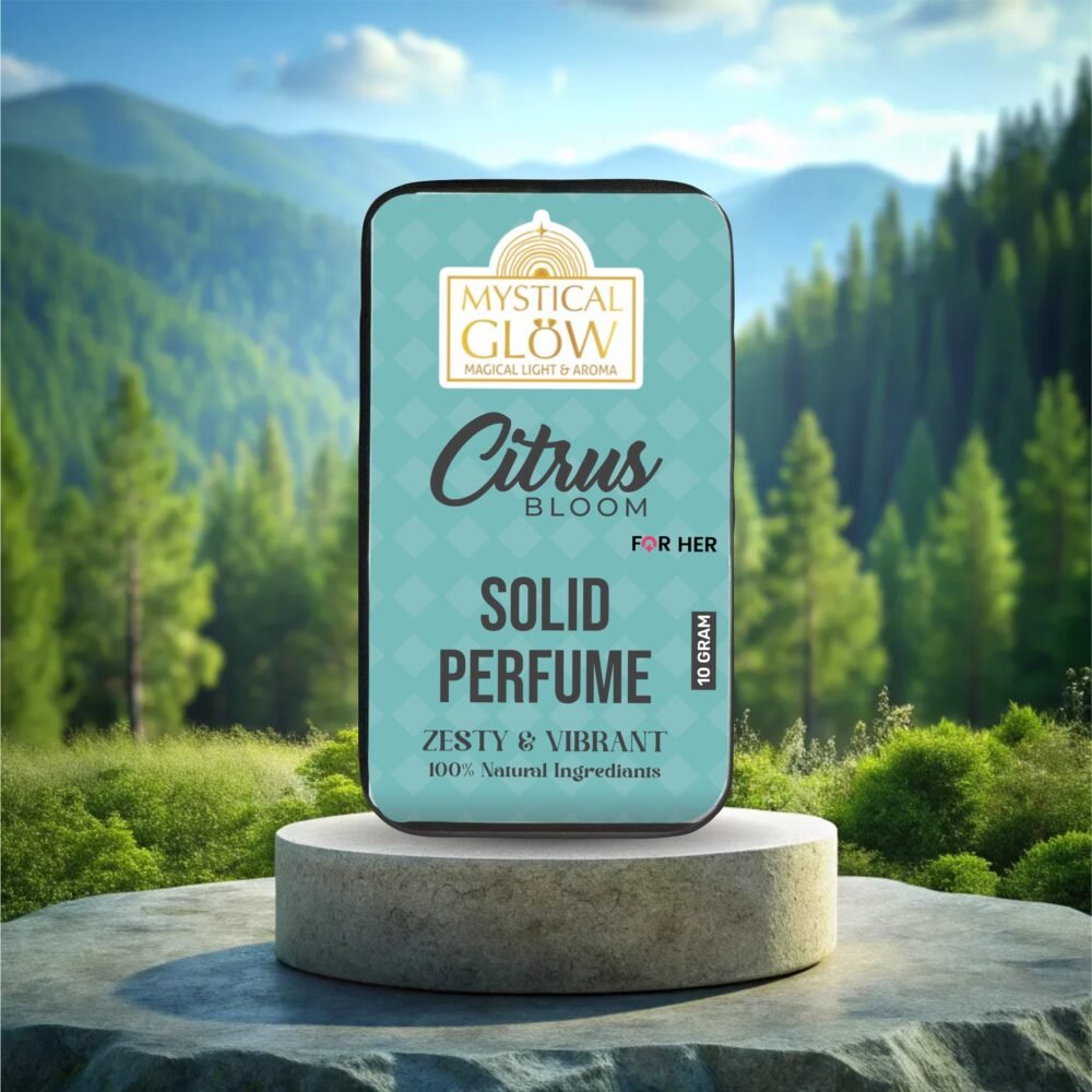 Citrus Bloom solid perfume tin styled with citrus slices and white blossoms on a wooden tray.