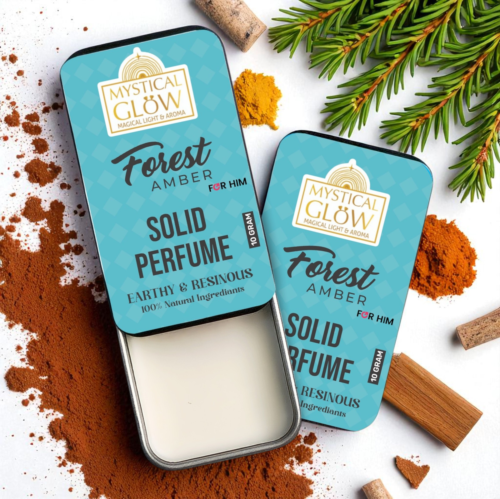 Forest Amber Solid Perfume for Men by Mystical Glow shown in a round eco-friendly tin on white background with natural props like pinecones, amber resin, and green leaves – alcohol-free, long-lasting, skin-safe men's fragrance. forest amber solid perfume for men