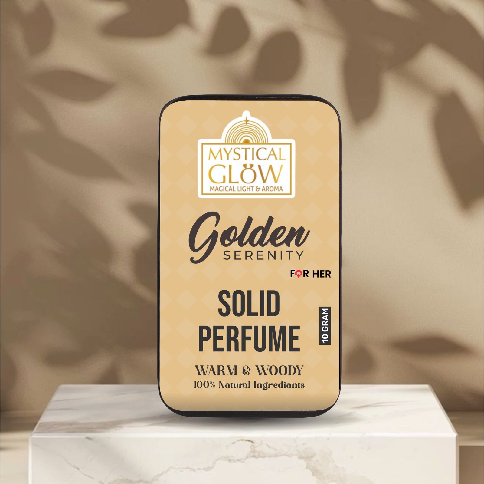 Golden Serenity solid perfume tin displayed aesthetically on a rustic wooden platform with soft ambient light.