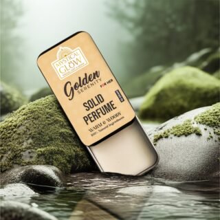 Golden Serenity – A Story of Elegance, Confidence & Timeless Scent Woman applying Golden Serenity solid perfume on wrist using finger from portable tin.