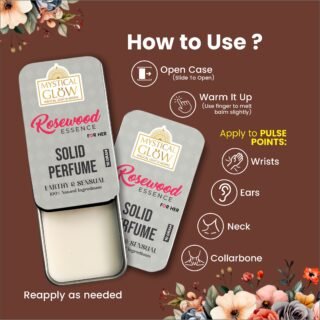 Slide, Dab & Go – Travel Size Solid Perfume for Wrists, Neck, Collarbone Rosewood Essence tin placed on wooden background with rose petals, vintage jewelry, and silk cloth to reflect romantic essence.