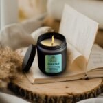 Eco-friendly soy candles in India burning on wooden table showcasing clean burn