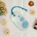 close-up of a wax sachet with dried botanicals